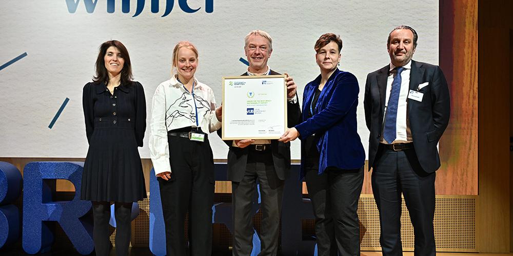 Jan Danckaert en team nemen award in ontvangst